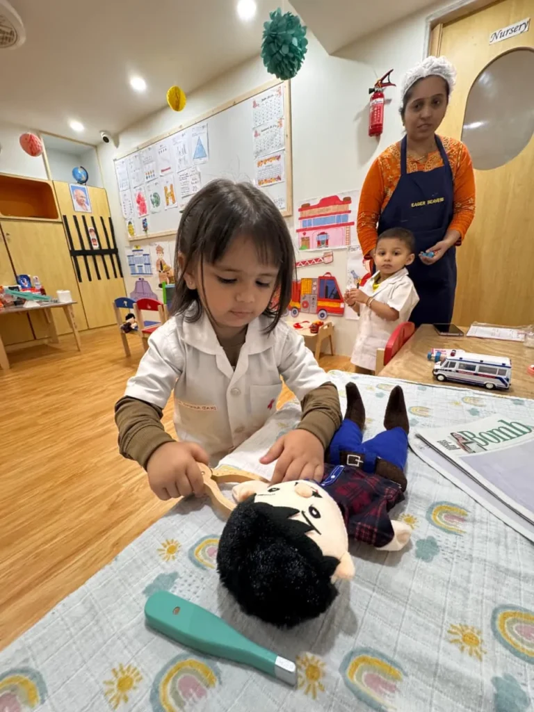 Pre-nursery child playing doctor